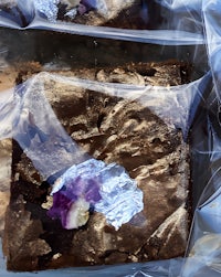 a piece of chocolate cake in a plastic bag